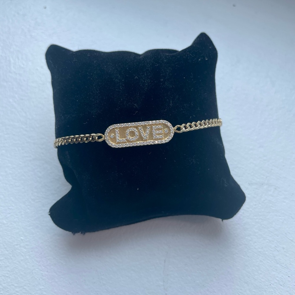 Gold over silver love bracelet